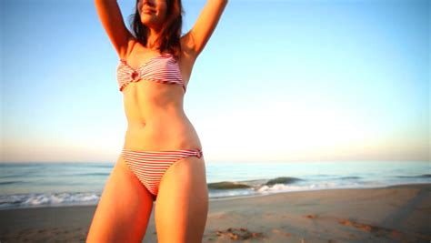 Beautiful Girl Dances On The Beach In A Bikini At Sunrise Barcelona Spain Stock Footage Video