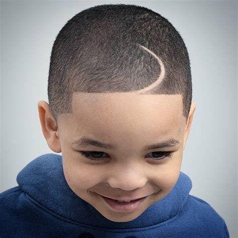 1.7 low fade with spiky hair; 22 Cool Haircuts For Boys: 2021 Trends