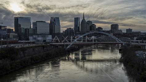 City Skyline Bridges Spanning The Cumberland River At Sunset Downtown