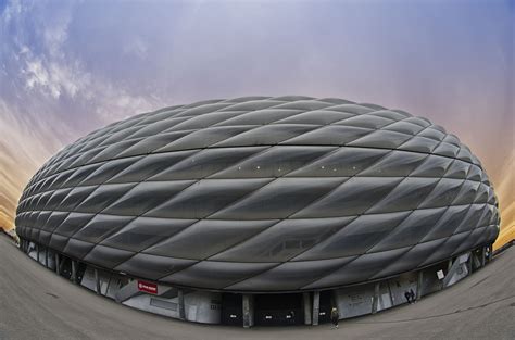 Widely known for its exterior of inflated etfe plastic panels, it is the first stadium in the world with a full colour changing exterior. allianz arena | Architecture, Cloud gate, Clouds