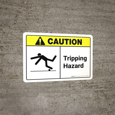 Caution Tripping Hazard With Icon Ansi Landscape Wall Sign