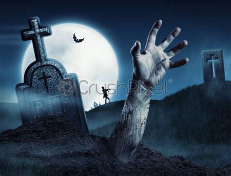 Skeleton Zombie Hand Rising Out Of A Graveyard Halloween Stock Photo