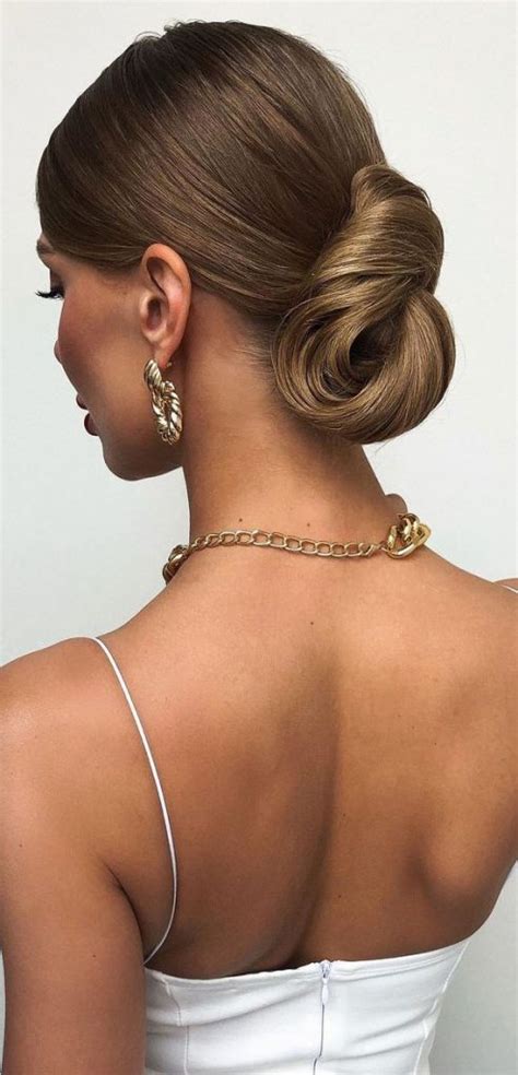 Sophisticated Updos For Any Occasion Twisted Sleek Low Bun
