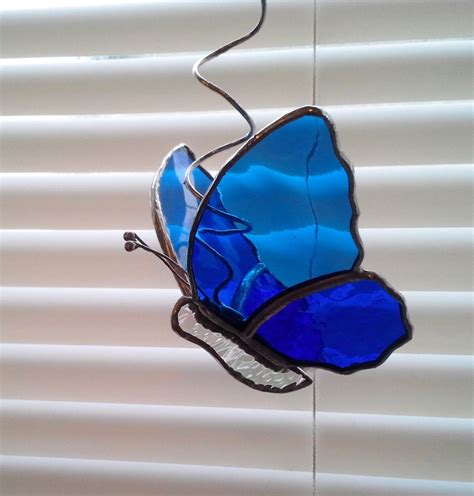 Stained Glass Butterfly Sun Catcher On Coiled Hanger Blues By