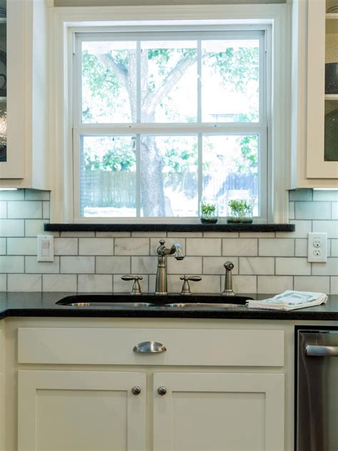 You could also taper your tile or angle your stone backsplash to gradually connect the top to the bottom. Kitchen Window | Joanna gaines kitchen, Kitchen remodel ...