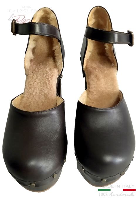 Gli stivaletti hanno doppia cerniera, una color metallo sul lato esterno e una nera sul lato interno. Sandali Sabot Invernali Pellicciotto Scarpe Donna con Pelo