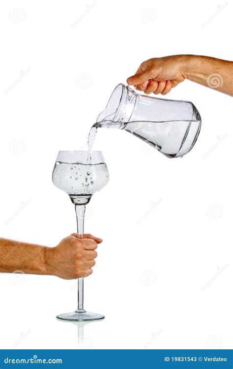 Hand Pouring Water From Glass Jug Stock Photos Image 19831543