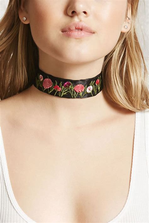 A Satin Choker Featuring A Floral Embroidery High Polish Accents And