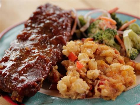 Pile chicken breasts, broth, bell peppers, beans, tomatoes, onion, and spices into the slow cooker and let it do its thing for a few hours. Sticky Spicy Slow-Cooked Ribs Recipe | Ree Drummond | Food ...
