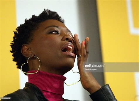 South African Singer Lira Wipes Away A Tear As She Attends A Press