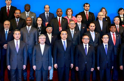 Premier Li Keqiang Stands With Delegates At The 54th Annual Session Of