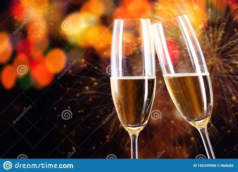 Two Champagne Glasses Ready To Bring In The New Year Holiday Lights