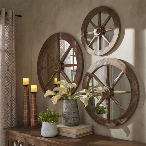 Amish wagon wheels are functional, but sold individually for their beauty as accent items.amish wagon wheels can be used in a variety of decor what could you do with an amish wagon wheel? Shop Moravia Round Reclaimed Wood Wagon Wheel Wall Mirror ...