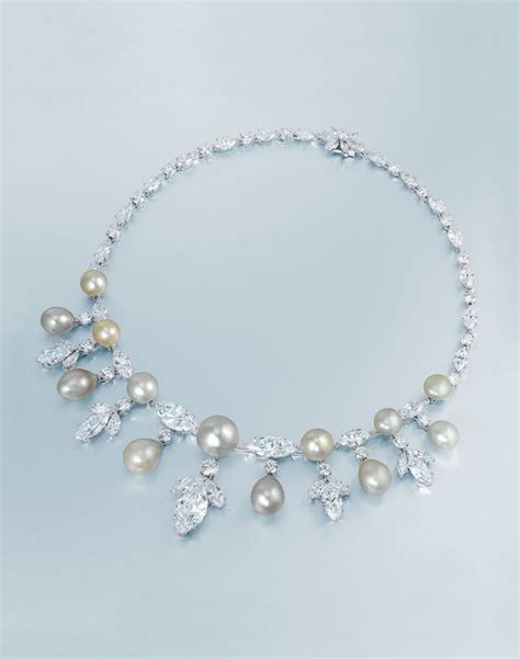 An Elegant Natural Pearl And Diamond Necklace By Moussaieff Alainr