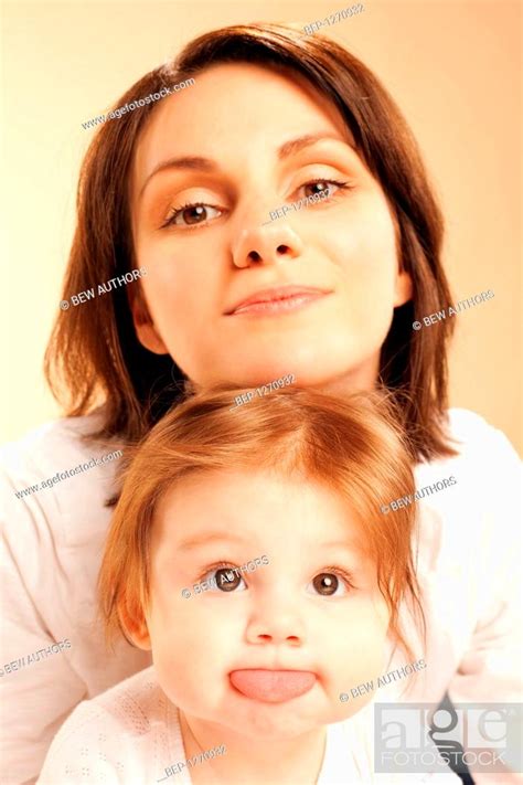 Woman Looking After Her Child Stock Photo Picture And Rights Managed
