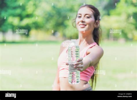 Sport Women Hand Show Drinking Water Bottle For Recommend To Drink