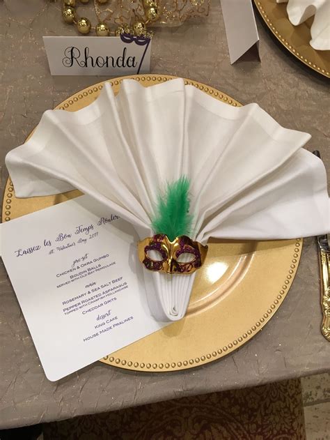 No one at the dinner party was social distancing and nobody was wearing masks. Mask napkin ring at a Mardi Gras themed dinner party ...