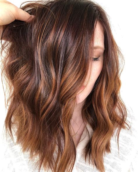 This deep auburn hair color is just majestic to look at. 50 Dark Brown Hair with Highlights Ideas for 2020 - Hair ...