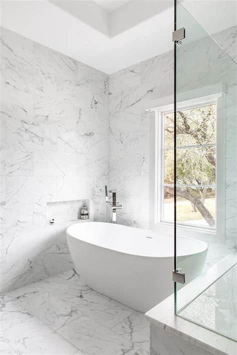 Marble Tiled Niche Over Freestanding Oval Bathtub Transitional