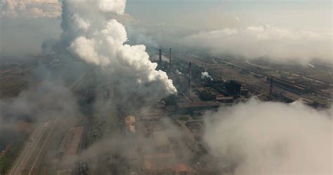 Epic Aerial Of High Pipes With Smoke Emission Plant Pipes Pollute