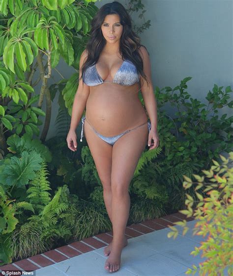 Kim Kardashian Shows Off Baby Bump In Bikini Just Days Before She Was