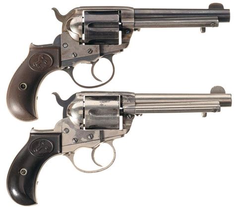 Two Colt Model 1877 Double Action Revolvers A Colt Model 1877