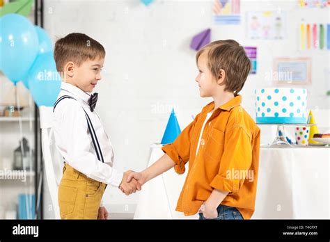 Two Children Shaking Hands