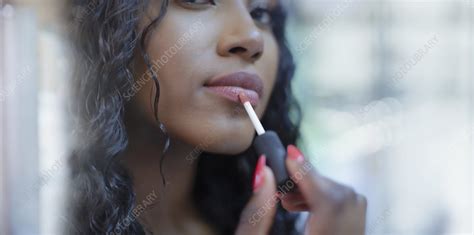 Close Up Beautiful Woman Applying Lip Gloss Stock Image F028 6915 Science Photo Library