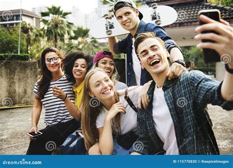 Friends In The Park Taking A Group Selfie Millennial And Youth C Stock