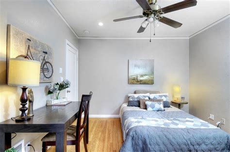 How to clean mold from a wooden ceiling. Transitional Guest Bedroom with Hardwood floors, Crown ...