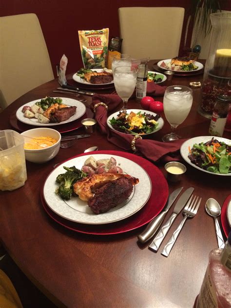Place a lobster claw and half of a tail on top of each steak. Steak and lobster on the grill, broccolli, potatoes and salad | Romantic dinners, Steak and ...