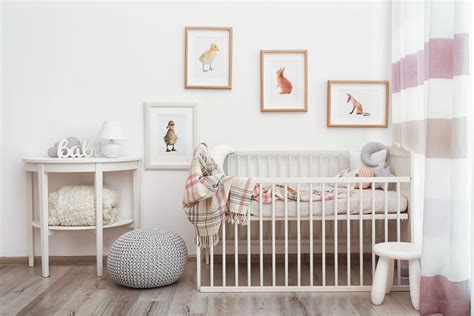 Whimsical wallpaper with flying birds in the nursery. 15 Adorable Ideas for an Animal-Themed Nursery