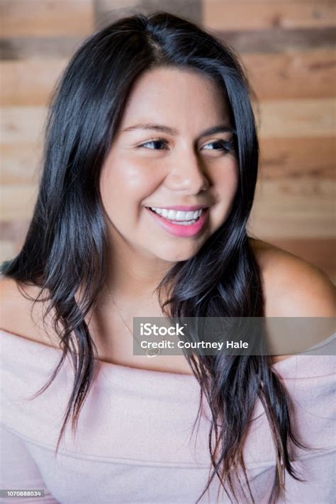 Portrait Of A Young Adult Hispanic Female Stock Photo Download Image