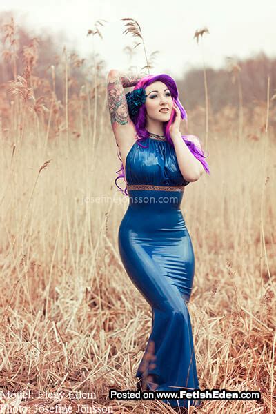 Beauty Comes In The Form Of A Purple Haired Lady With Tattoos In Blue