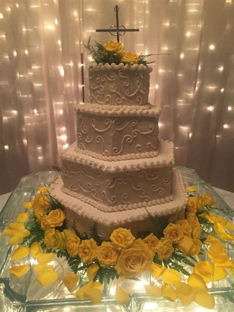 Add leaves to frosted cake in between the flowers with dabs of frosting. Laura's wedding cake: Margarita cake with margarita ...