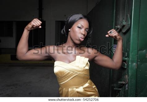 Young Black Woman Flexing Her Arms Stock Photo Edit Now 54252706