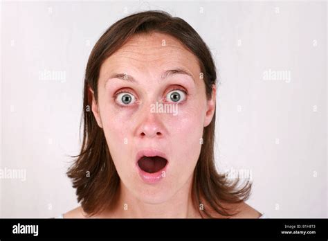 Young Brunette Woman With Shocked Surprised Stunned Aghast Amazed