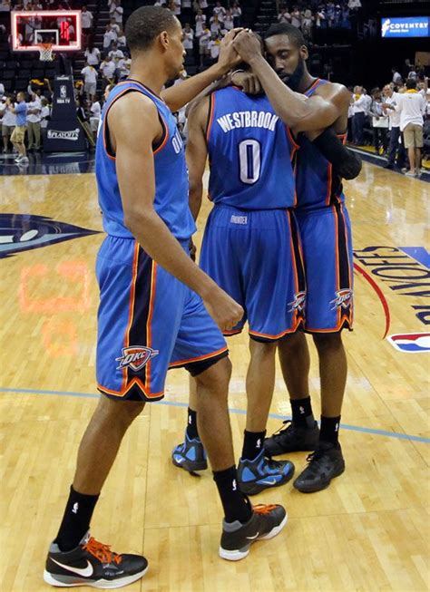 Houston's james harden (13) looks to get by oklahoma city's paul george (13) during the harden spilled onto the floor, and the crowd cheered. james harden russell westbrook thabo sefalosha okc thunder