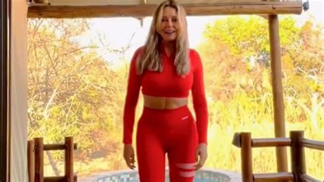 carol vorderman shows off her amazing abs in skintight lycra as she works up a sweat the irish sun
