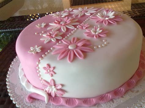 From handprints to photo gifts, get our best mother's day craft ideas kids will love crafting these flowering candy dishes with an item you probably already have in your house: White & Pink Flower Cake | Cake decorating, Creative cake ...