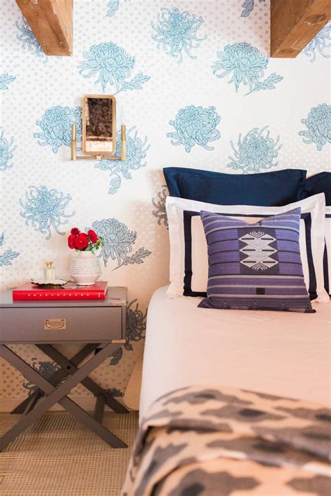 Eclectic Bedroom With Floral Wallpaper And Red Accents Hgtv