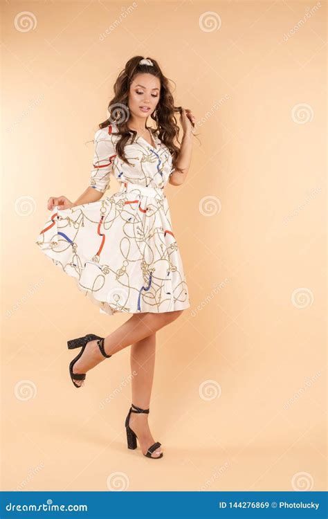 Front View Of Girl In White Light Dress Looking At Camera Stock Image Image Of Indoors
