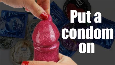 put a condom on for international condom day youtube