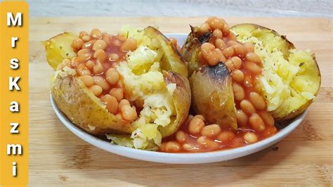 Cheesy Baked Potatoes Served With Baked Beans Quick Jacket Potato Recipe At Home Restaurant