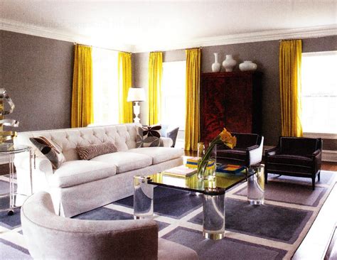 Yellow is one of the most versatile and adaptable colors that you will ever come across, and despite its wide range of however, working with yellow can be a tad bit tricky in a space like the living room, where you want to make a. dramatic floor to ceiling mustard drapes on a gray wall with white accents | Living room drapes ...