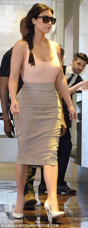 Kim Kardashian Flashes Sideboob As She And Kanye West Step Out In Paris