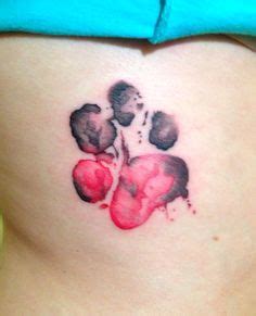 Double paw prints in watercolor at calf. Watercolor Paw Print Tattoo Designs, Ideas and Meaning ...