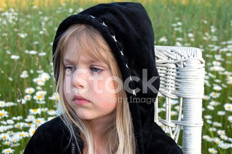 Sad Little Girl In Black Hoodie Stock Photo Royalty Free Freeimages