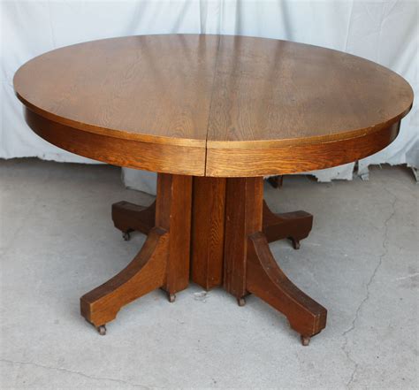 Round dining table with lazy susan color: Bargain John's Antiques | Antique Mission style Round Oak ...