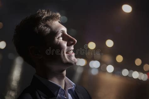 Portrait Of Smiling Young Man Profile Bright Light